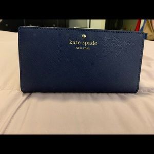 kate spade navy blue bi-fold wallet